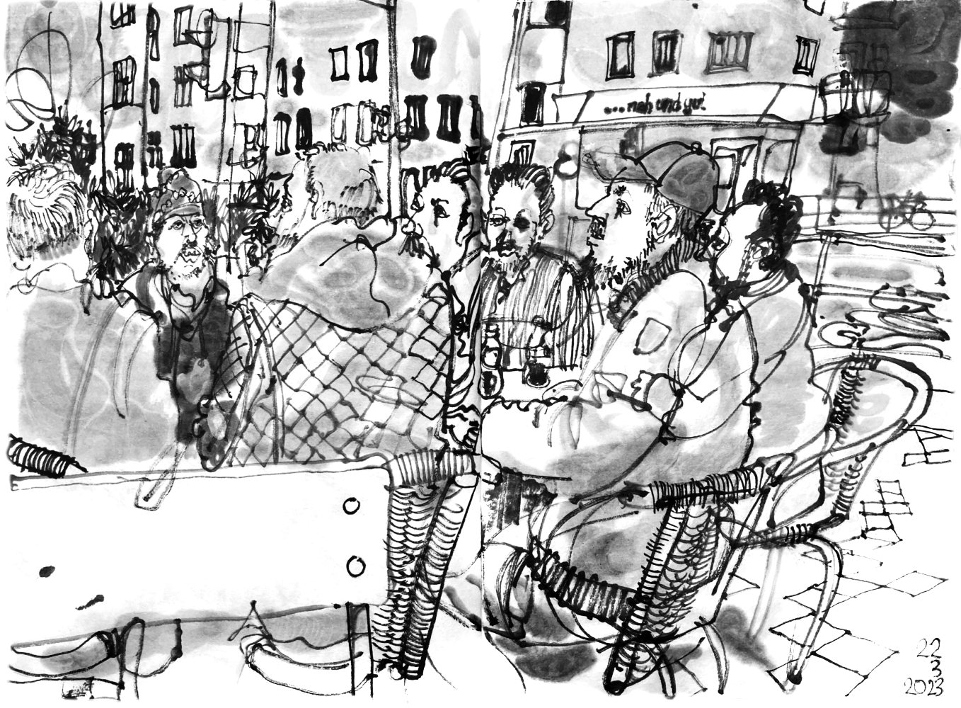 Eine Gruppe Männer vor dem Imbiss Enjoy Kebap